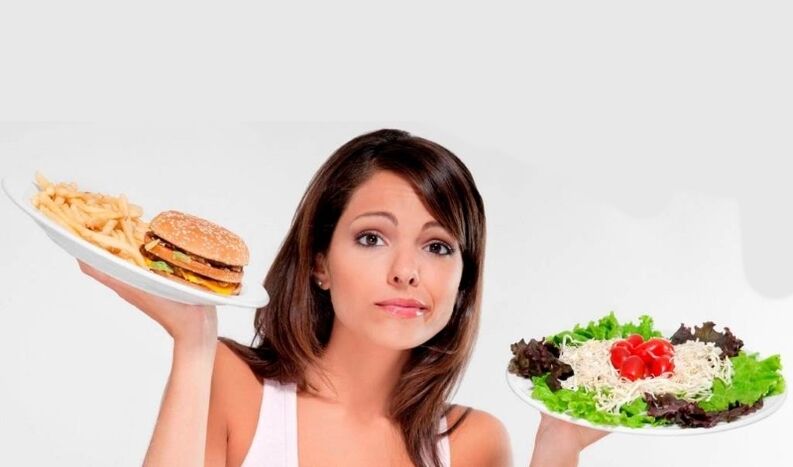 Dívka dodržuje antipurinovou dietu k léčbě dny. 